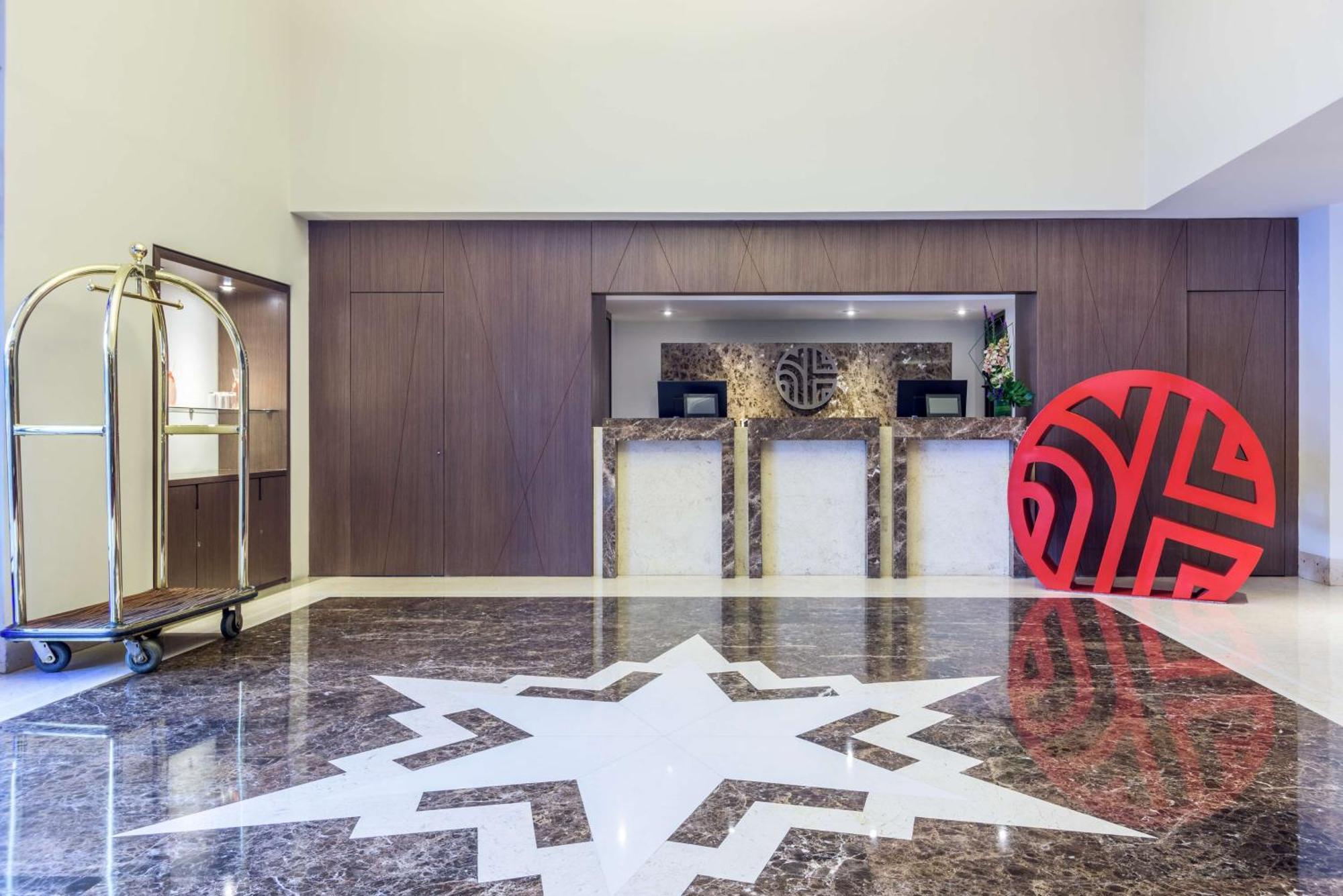 فندق إن إتش كولكشن رويال أندينو بوغوتا المظهر الخارجي الصورة The lobby of the hotel