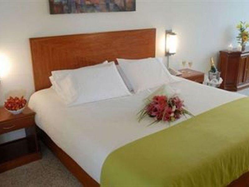 فندق إن إتش كولكشن رويال أندينو بوغوتا المظهر الخارجي الصورة A bedroom at the hotel